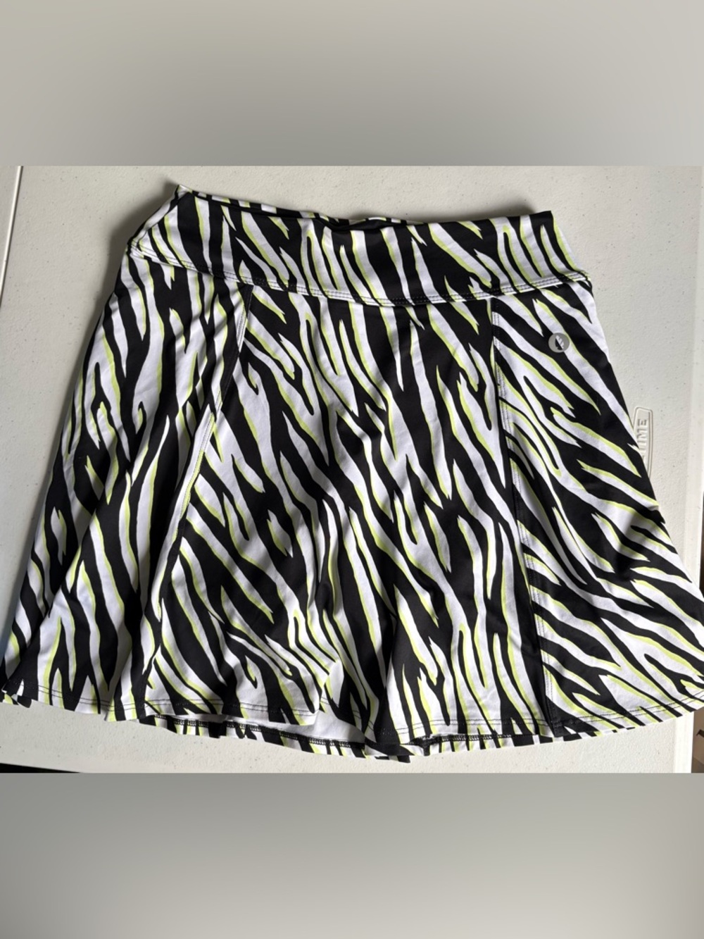 Dona Jo women’s Zebra Print Athletic Skort with Lime Accents